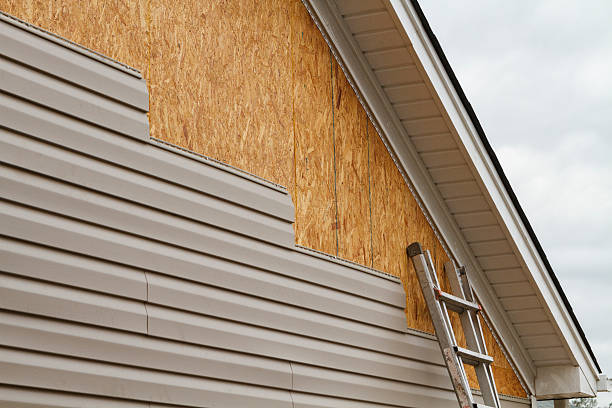 Professional Siding Contractor technician working in Paxinos, PA